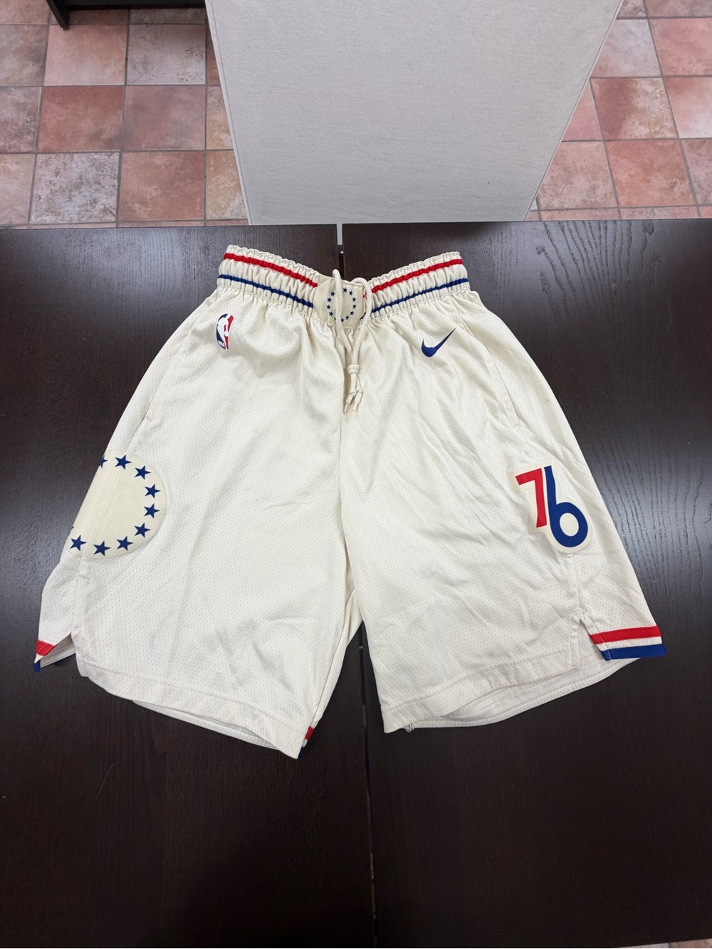 One pair of size large Nike basketball shorts